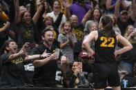 Iowa's Caitlin Clark reacts after an NCAA Women's Final Four semifinals basketball game against South Carolina Friday, March 31, 2023, in Dallas. Iowa won 77-73 to advance to the championship on Sunday. (AP Photo/Tony Gutierrez)