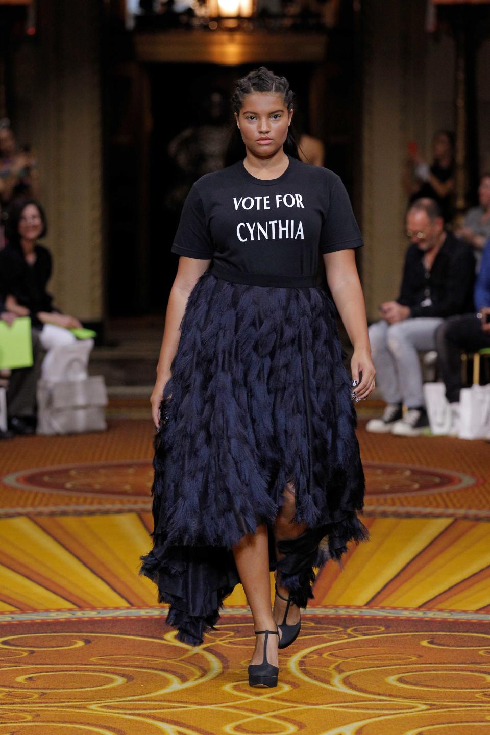 A model wears a statement T-shirt emblazoned with the words “Vote for Cynthia” at Christian Siriano’s Spring 2019 show during New York Fashion Week. (Photo: Dan Lecca/Courtesy of Christian Siriano)