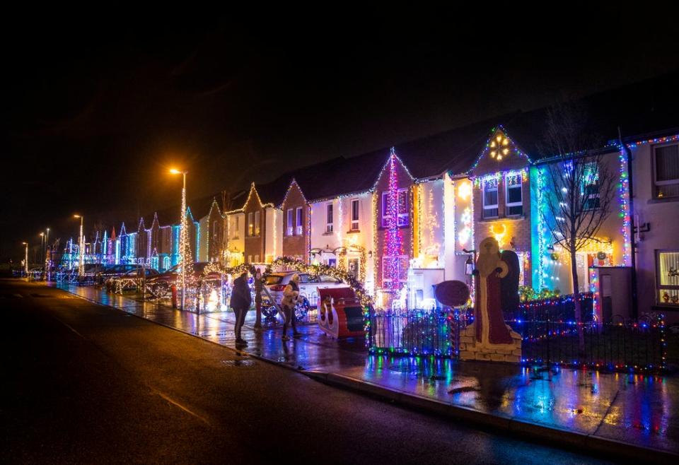 Residents of Racecourse Drive in Derry recreate their annual ‘Christmas Drive’ to raising funds for local charities by transforming the street into a winter wonderland. PA Photo. Picture date: Tuesday December 07 2021. See PA story XMAS Street. Photo credit should read: Liam McBurney/PA Wire