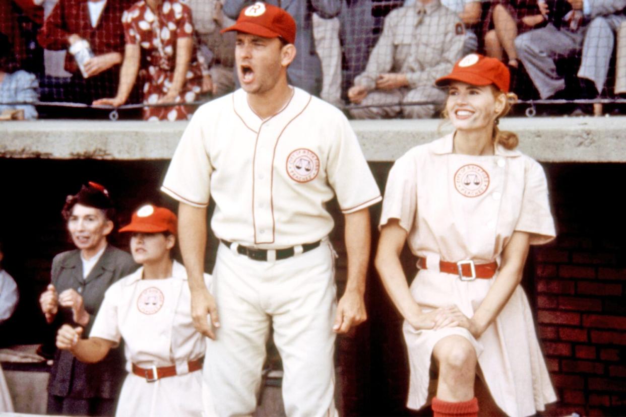 A LEAGUE OF THEIR OWN, foreground: Tom Hanks, Geena Davis, 1992. © Columbia Pictures/ Courtesy Everett Collection.