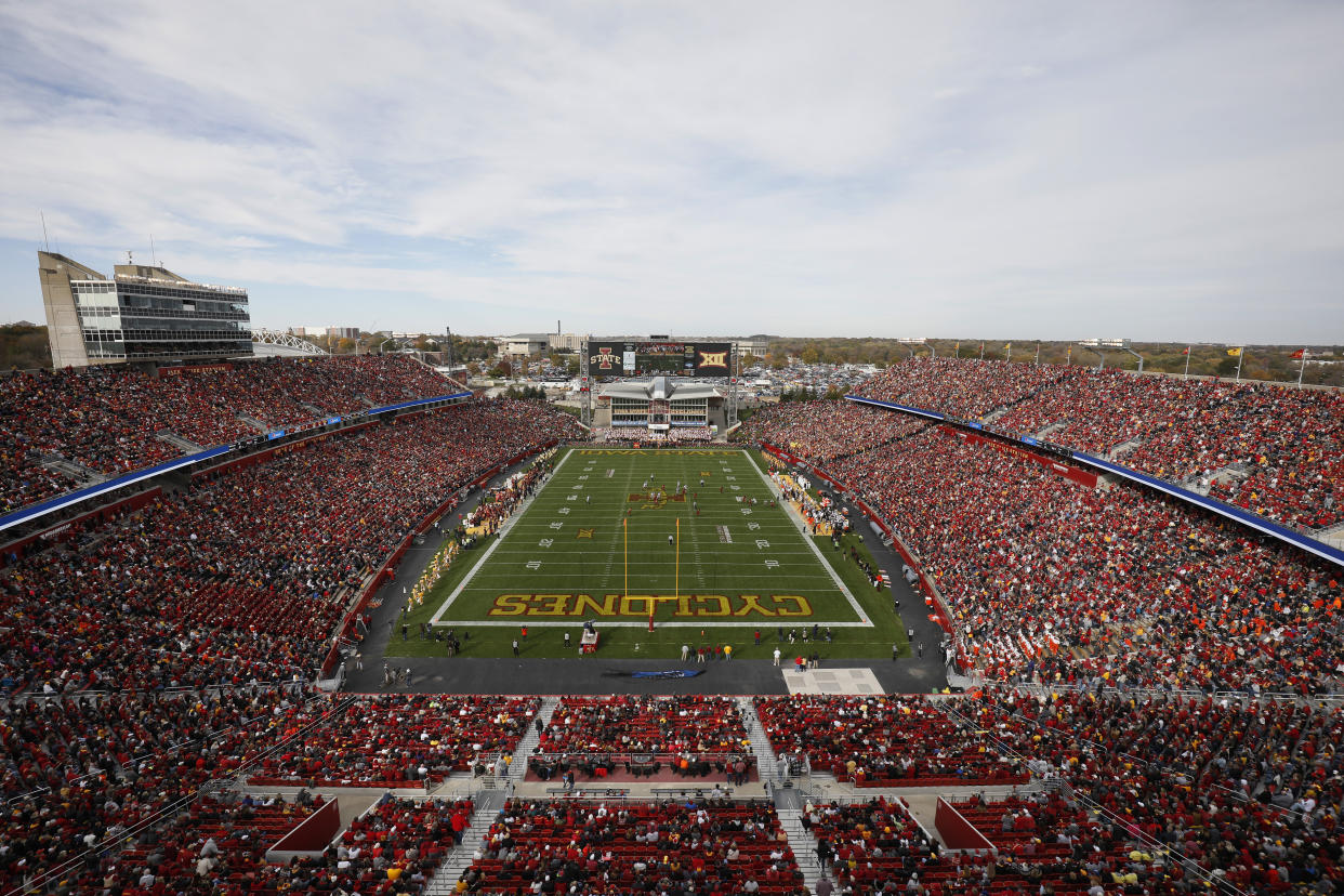 One Iowa State fan was hospitalized after he fell over the upper deck wall into the lower bowl of the stadium on Saturday.