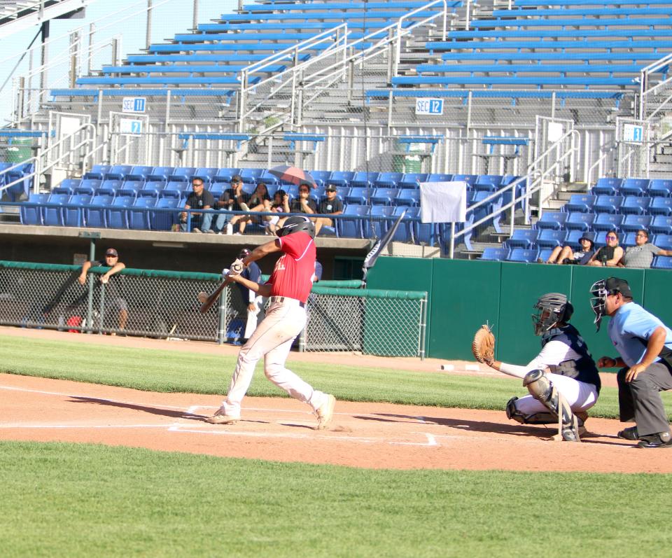 Shiprock Angels LeVon Begay connects on a bases-clearing triple in the bottom of the first inning of a Connie Mack City League game against the Shiprock Dodgers at Ricketts Park on Thursday, June 9, 2022.