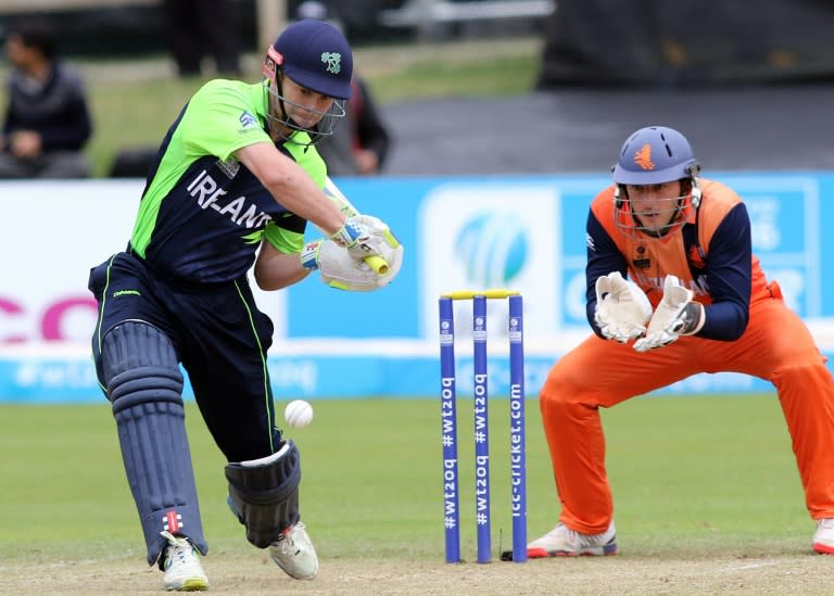 Ireland's William Porterfield (L) plays a shot during the ICC World Twenty20 qualifer against the Netherlands at Malahide cricket club, north of Dublin on July 25, 2015