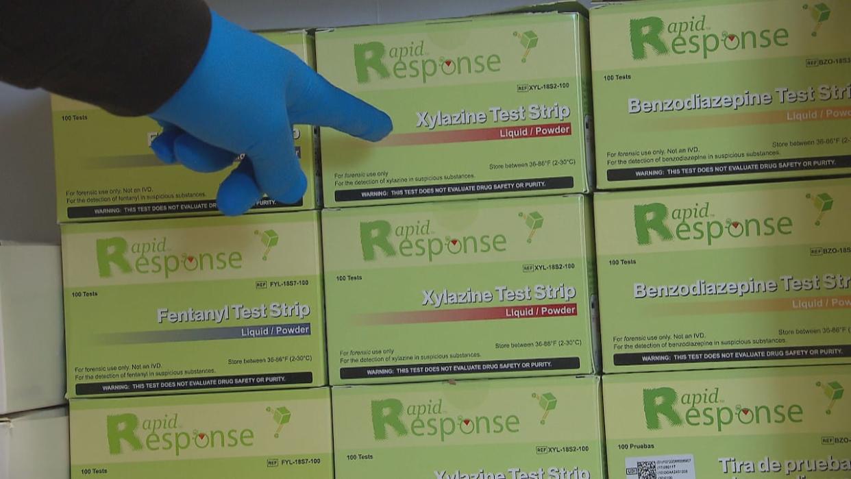 Ensemble Moncton is providing drug testing to clients using a spectroscopy machine and test strips to detect evidence of xylazine. (Ian Bonnell/CBC  - image credit)