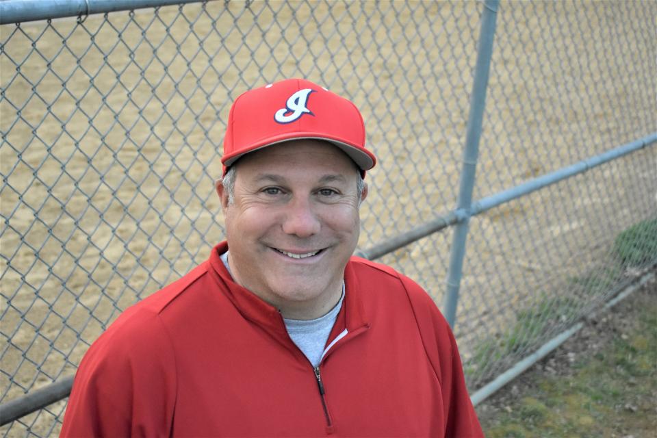 Ketcham Assistant Coach Joe Emanuelo, wearing the Ketcham hat with an "I" for Indian on the cap, said he expected the district would make the appropriate adjustments to comply with the state regulations.