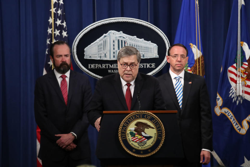 U.S. Attorney General William Barr speaks about the release of the redacted version of the Mueller report as U.S. Deputy Attorney General Rod Rosenstein and U.S. Acting Principal Associate Deputy Attorney General Ed O’Callaghan listen at the Department of Justice April 18, 2019 in Washington, DC. | Win McNamee—Getty Images