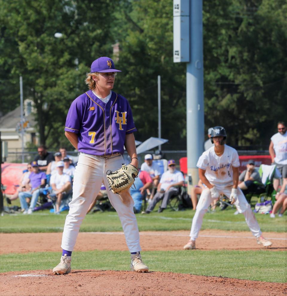 Hagerstown senior Quaid Mull looks to his catcher for a sign during a regional game against Heritage Christian June 3, 2023.