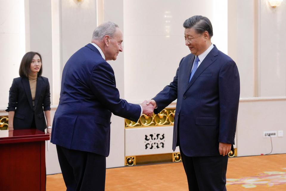 U.S. Senate Majority Leader Chuck Schumer, D-N.Y., greets Chinese President Xi Jinping in Beijing on Oct. 9, 2023. Schumer says he's grateful for a strengthened statement from China condemning the killing and kidnapping of Israeli and foreign civilians by Hamas, issued during a bipartisan congressional visit to Beijing.