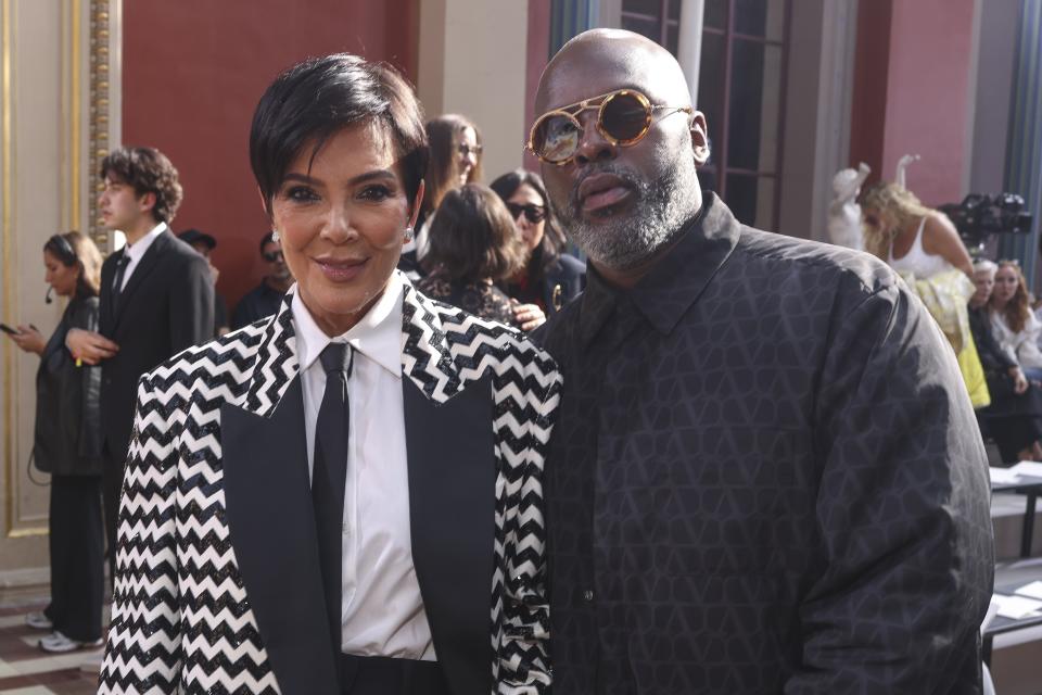 Kris Jenner, left, and Corey Gamble attend the Valentino Spring/Summer 2024 womenswear fashion collection presented Sunday, Oct. 1, 2023 in Paris. (AP Photo/Vianney Le Caer)