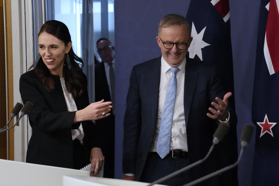 New Zealand Prime Minister Jacinda Ardern, left, and Australia's Prime Minister Anthony Albanese smile as they arrive for a press conference in Sydney, Australia, Friday, July 8, 2022. (AP Photo/Rick Rycroft)