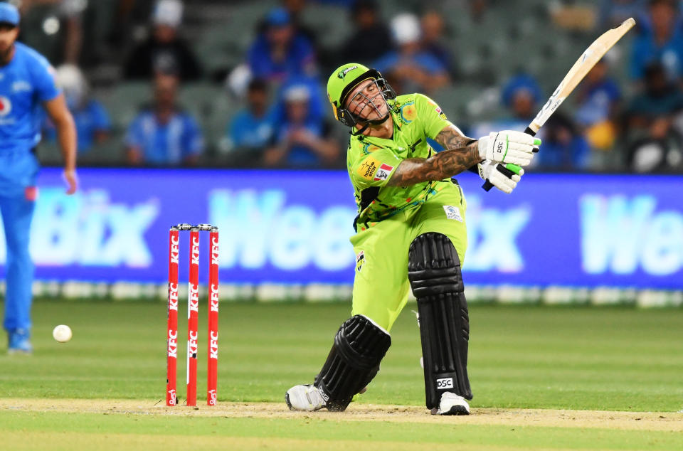 Alex Hales of the Thunder beaten by Chris Tremain of the Thunder during the Big Bash League match between the Adelaide Strikers and the Sydney Thunder at Adelaide Oval, on January 25, 2021, in Adelaide, Australia.