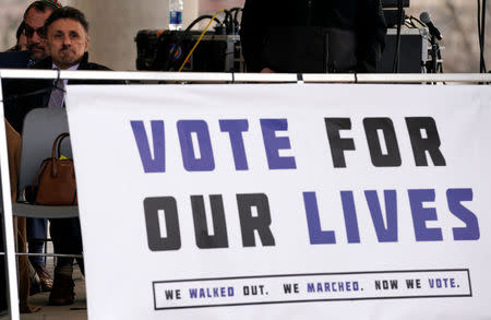 Former Columbine principal Frank DeAngelis looks on as teens kick off a voter registration rally, a day ahead of the 19th anniversary of the massacre at Columbine High School, in Littleton, Colorado, U.S., April 19, 2018. REUTERS/Rick Wilking