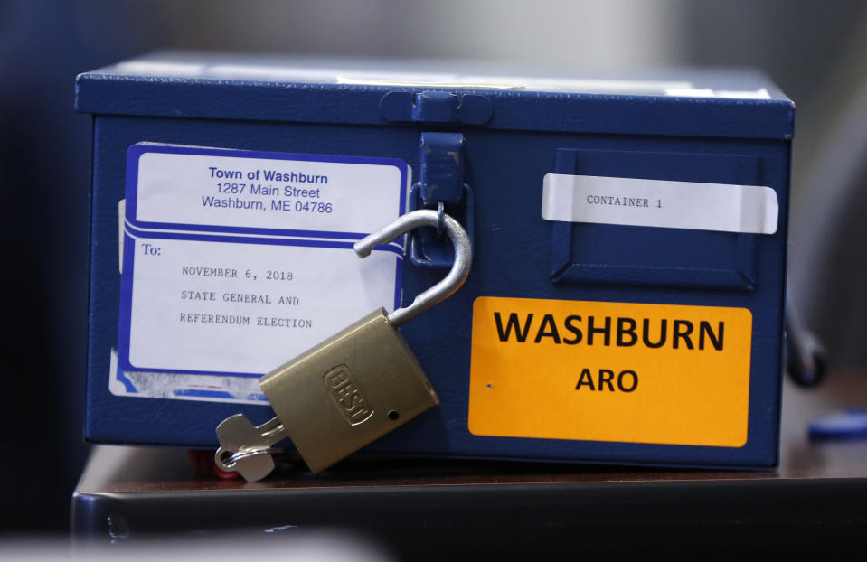 A ballot box is seen during the vote tabulation process for Maine's Second Congressional District's House election Monday, Nov. 12, 2018, in Augusta, Maine. The election is the first congressional race in American history to be decided by the ranked-choice voting method that allows second choices. (AP Photo/Robert F. Bukaty)