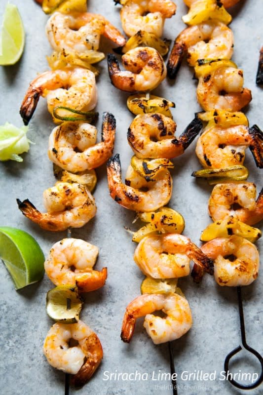 <p>The Little Kitchen</p><p>I love grilled shrimp and it's perfect for the summer AND al fresco dining. This recipe is so easy…it will take you no time to prepare it!</p><p><strong>Get the Recipe: </strong><a href="https://www.thelittlekitchen.net/sriracha-lime-grilled-shrimp/" rel="nofollow noopener" target="_blank" data-ylk="slk:Sriracha Lime Grilled Shrimp;elm:context_link;itc:0;sec:content-canvas" class="link ">Sriracha Lime Grilled Shrimp</a></p>