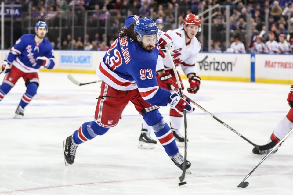 Nov 2, 2023; New York, New York, USA; New York Rangers center Mika Zibanejad (93) attempts a shot on goal in the second period against the Carolina Hurricanes at Madison Square Garden. Mandatory Credit: Wendell Cruz-USA TODAY Sports