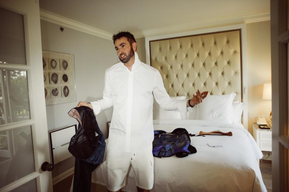 Ronald Gladden putting on his tuxedo for the Emmys