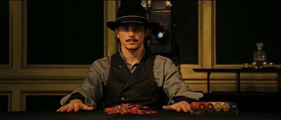 Josh Hartnett with poker chips in front of him