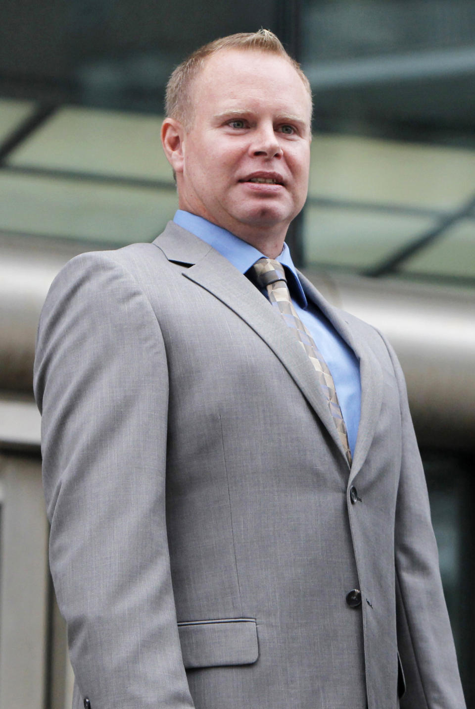 FILE - In this Oct. 19, 2010 file photo, former flight attendant Steven Slater leaves a Queens courthouse in New York. When a JetBlue flight landed at New York's John F. Kennedy International Airport one day in 2010, flight attendant Steven Slater decided he’d had enough. Slater swore at a passenger over the plane's public address system, grabbed a beer, pulled the emergency chute and slid down onto the tarmac. (AP Photo/Seth Wenig, File)