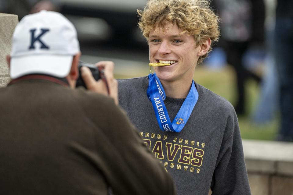 Brebeuf Jesuit High School senior Cameron Todd poses for a photo after winning the 78th annual IHSAA Boys Cross Country State Championship, Saturday, Oct. 28, 2023, at LaVern Gibson Championship Cross County Course.