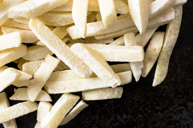 <p>Getty</p> Stock image of frozen french fries.