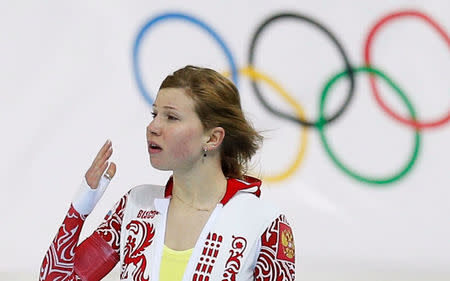 FILE PHOTO: Russia's Olga Fatkulina reacts after the women's 1,500 metres speed skating race in the Adler Arena at the Sochi 2014 Winter Olympic Games February 16, 2014. REUTERS/Issei Kato/File Photo