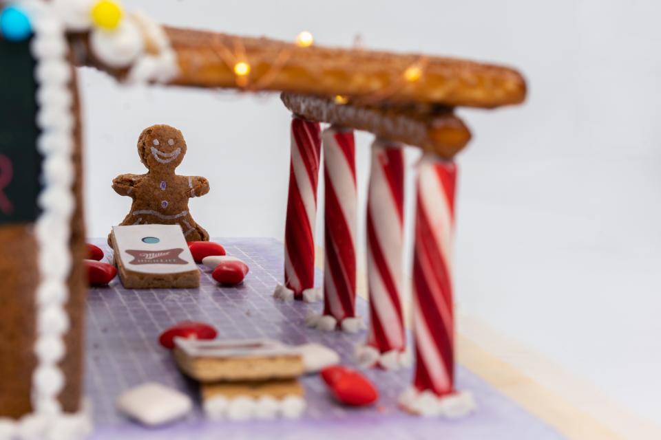 Miller High Life's gingerbread dive bar kits come with a pergola with cornhole underneath.