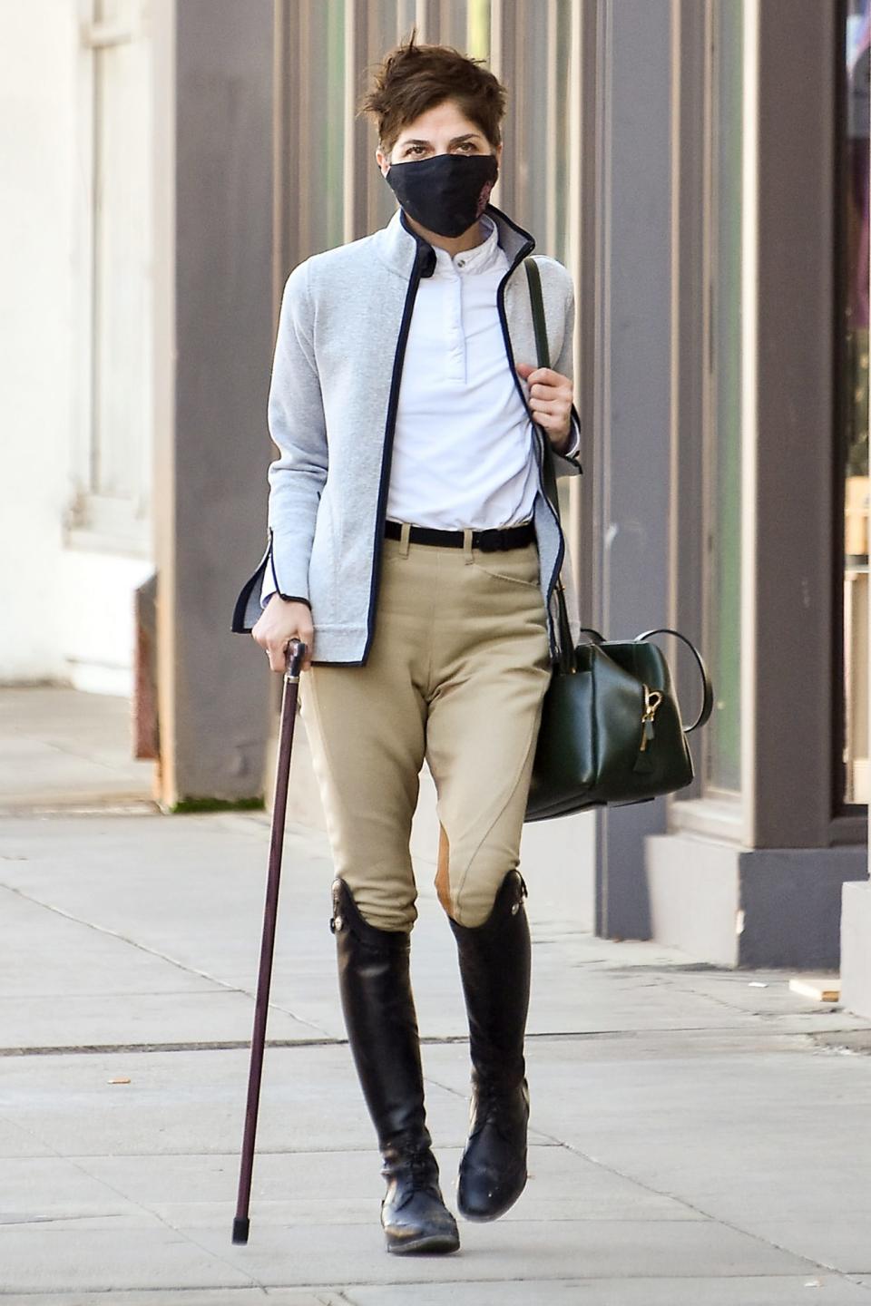 <p>Selma Blair steps out in a stylish white top and tan trousers with black knee high boots on Thursday in L.A.</p>