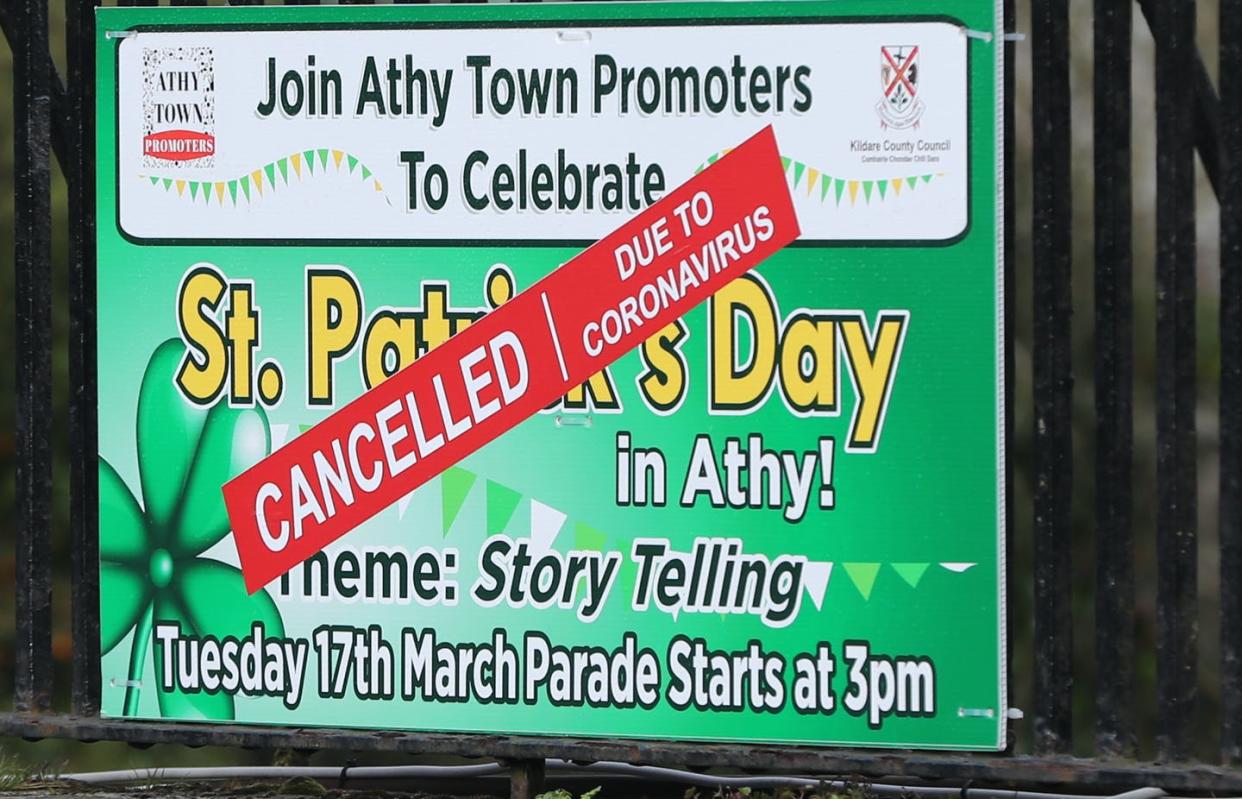 <span class="caption">A sign in County Kildare, Ireland. in March 2020. Epidemiologists around the world worked hard to try to stop big parties in the face of rising caseloads of what would come to be called COVID-19. </span> <span class="attribution"><a class="link " href="https://www.gettyimages.com/detail/news-photo/sign-anouncing-the-cancellation-of-a-st-patricks-day-parade-news-photo/1207443830?adppopup=true" rel="nofollow noopener" target="_blank" data-ylk="slk:Niall Carson/PA Images via Getty Images;elm:context_link;itc:0;sec:content-canvas">Niall Carson/PA Images via Getty Images</a></span>