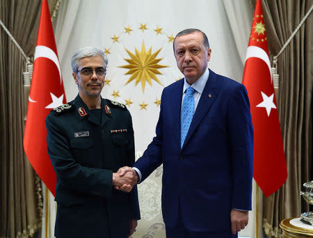 Turkish President Tayyip Erdogan meets with Iran's Chief of Staff Major General Mohammad Baqeri in Ankara, Turkey August 16, 2017. Kayhan Ozer/Presidential Palace/Handout via REUTERS