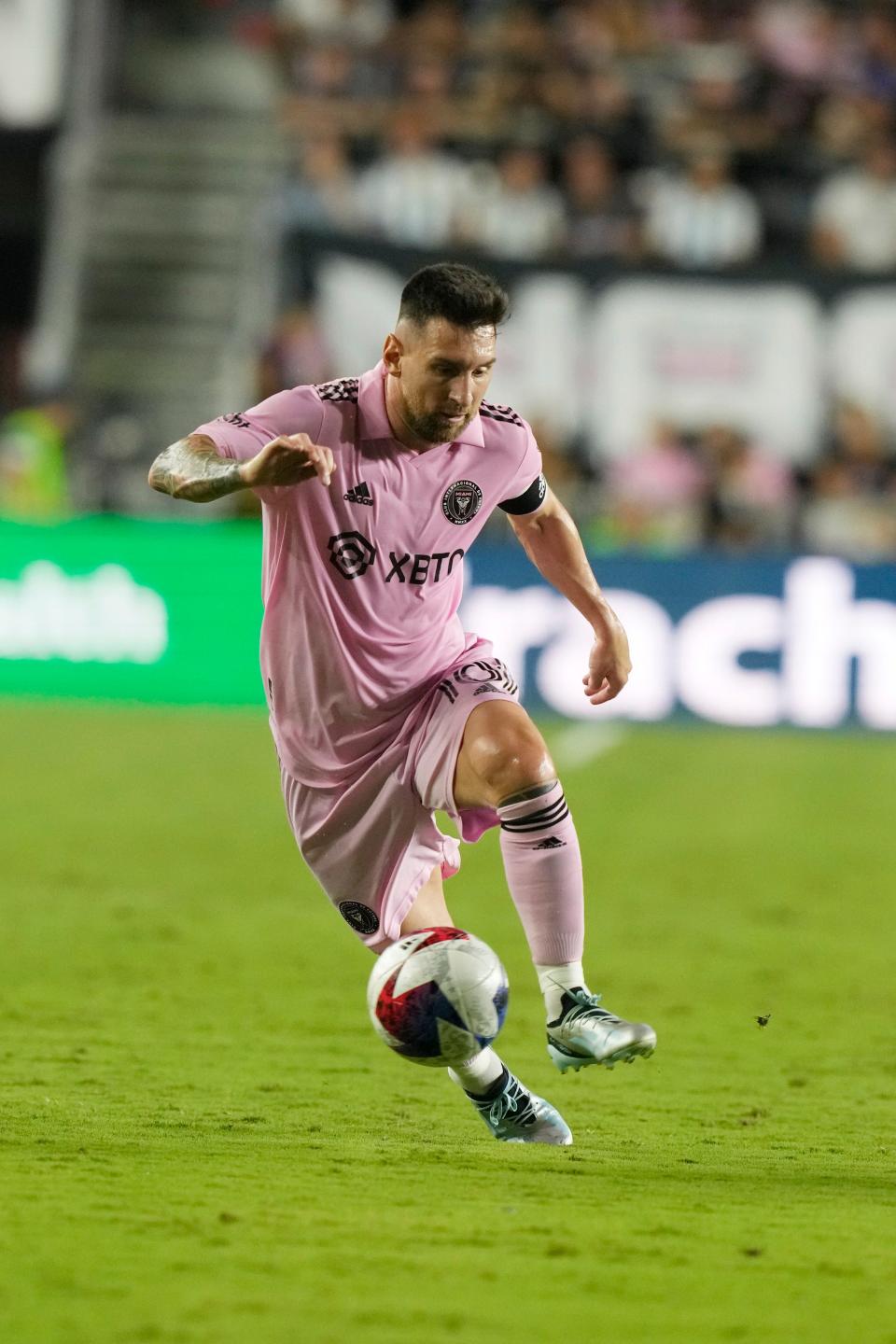 Inter Miami forward Lionel Messi (10) runs with the ball during the first half of an MLS soccer match against the Nashville SC, Wednesday, Aug. 30, 2023, in Fort Lauderdale, Fla. (AP Photo/Marta Lavandier) ORG XMIT: OTK