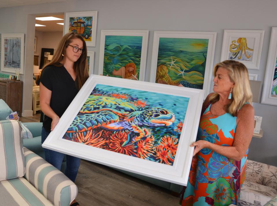 Marie Radlein and her mother, Susan Awad, in their furniture, art and consignment shop in downtown Cocoa Beach, called All Around the House. Part of their business is selling furniture to owners of vacation rental properties.