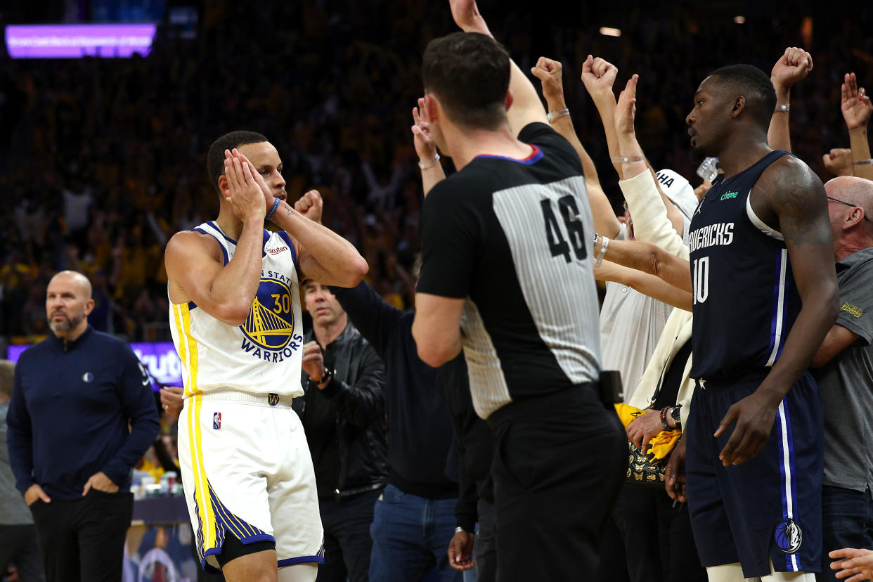 Golden State Warriors guard Stephen Curry celebrates with the 