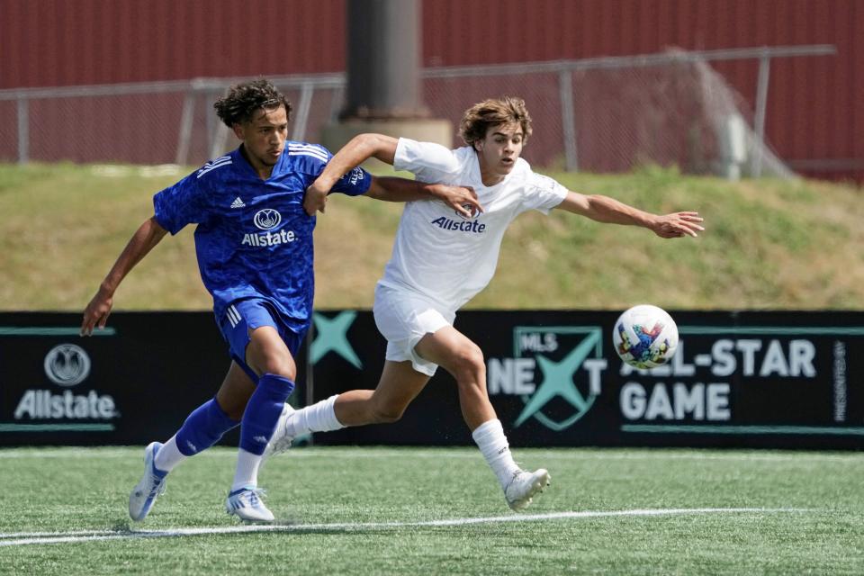 Aug 10, 2022; Blaine, MN, USA; MLS Next East player Benjamin Cremaschi (8) of Inter Miami CF battles for the ball against MLS Next West player Alejandro Carrillo (5) of Nashville SC during the second half of the 2022 MLS NEXT All-Star Game at National Sports Center Indoor Sports Hall.