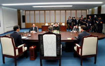 <p>South Korean President Moon Jae-in talks with North Korean leader Kim Jong Un during their meeting at the Peace House at the truce village of Panmunjom inside the demilitarized zone separating the two Koreas, South Korea, April 27, 2018. (Photo: Korea Summit Press Pool/Pool via Reuters/Reuters) </p>