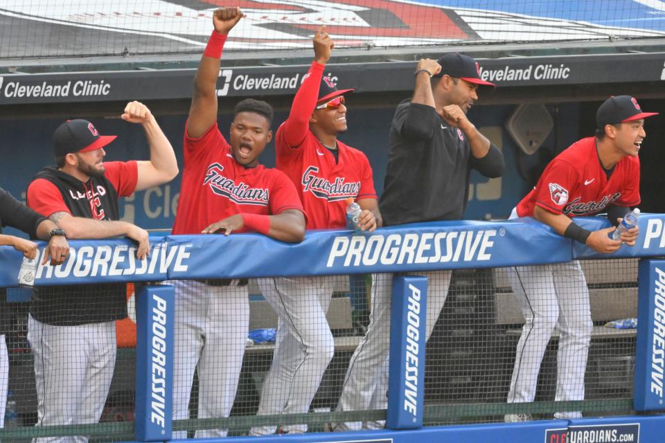 The Cleveland Guardians celebrate in the third inning against the Kansas City Royals, in Cleveland, May 31, 2022