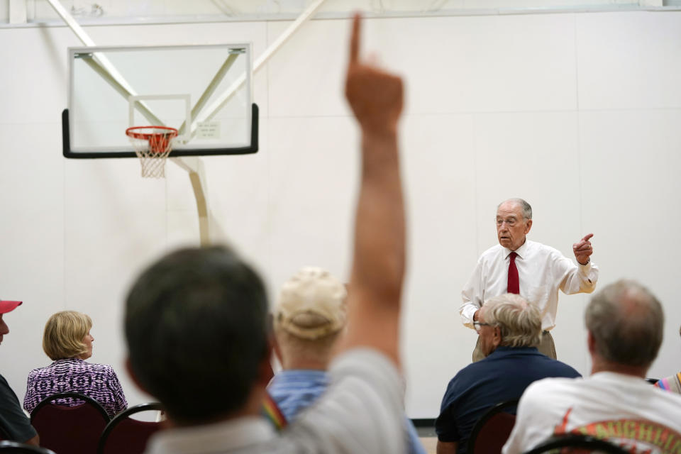 In this June 30, 2021, photo Sen. Chuck Grassley, R-Iowa, right, speaks during a town hall meeting in Ida Grove, Iowa. (AP Photo/Charlie Neibergall)