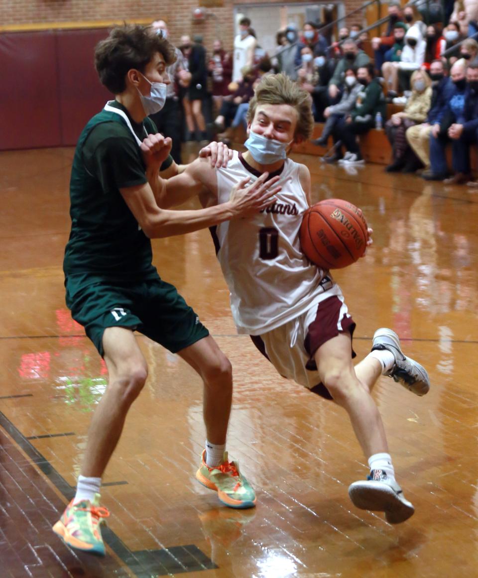 Ben Tingley-Prince drives hard to the basket Friday in Bishop Stang's 63-49 win over Dartmouth at the John C. O'Brien Gymnasium.