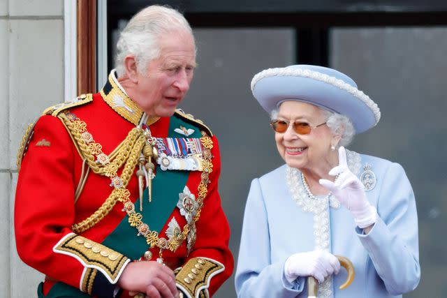<p>Max Mumby/Indigo/Getty </p> Then-Prince Charles and Queen Elizabeth on the balcony of Buckingham Palace at Trooping the Colour in June 2022.
