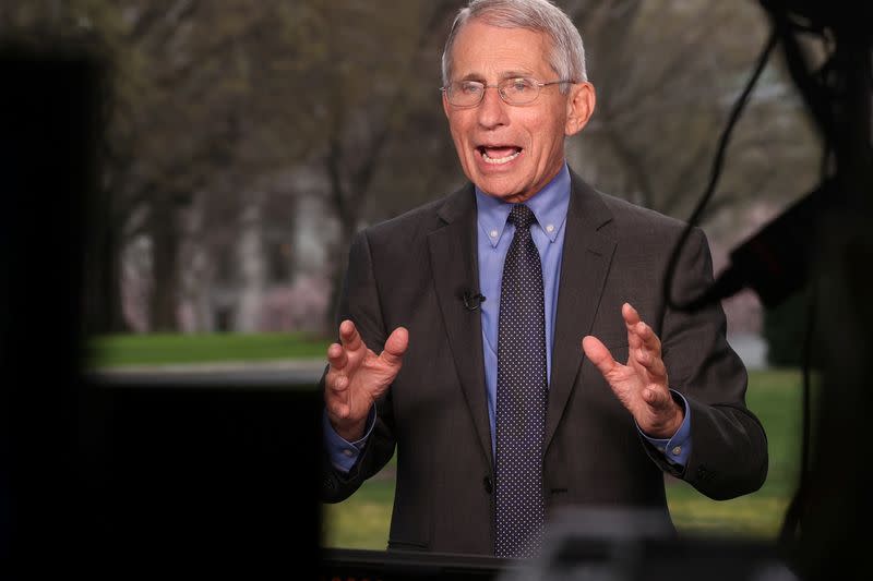 NIH’s Fauci gives television interviews about the Trump administration’s response to the coronavirus outbreak, at the White House in Washington