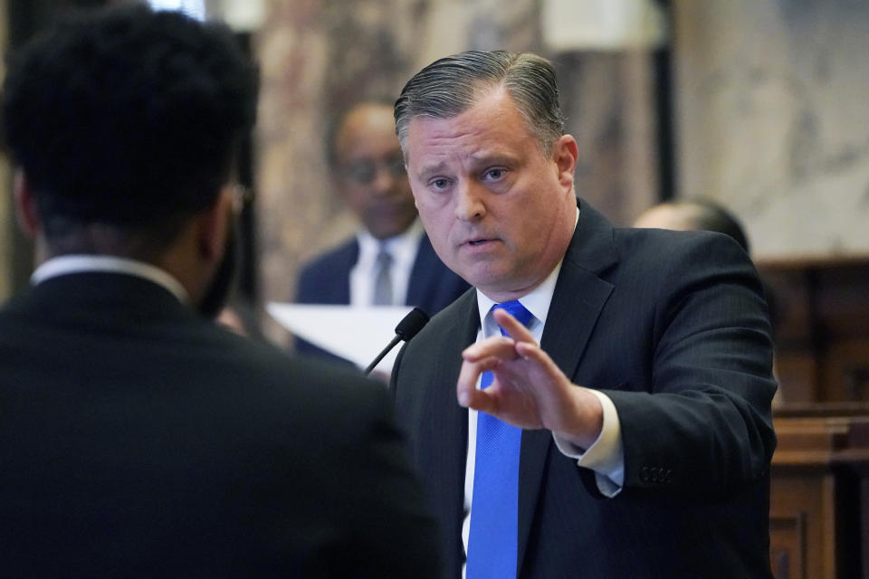 State Sen. Chad McMahan, R-Guntown, answers a lawmaker's question Wednesday, March 9, 2022, at the Mississippi Capitol before the state Senate passed a version of a bill that says Mississippi government entities could not withhold services or refuse jobs to people who choose not to get vaccinated against COVID-19. The bill will go to final negotiations between the House and Senate. (AP Photo/Rogelio V. Solis)