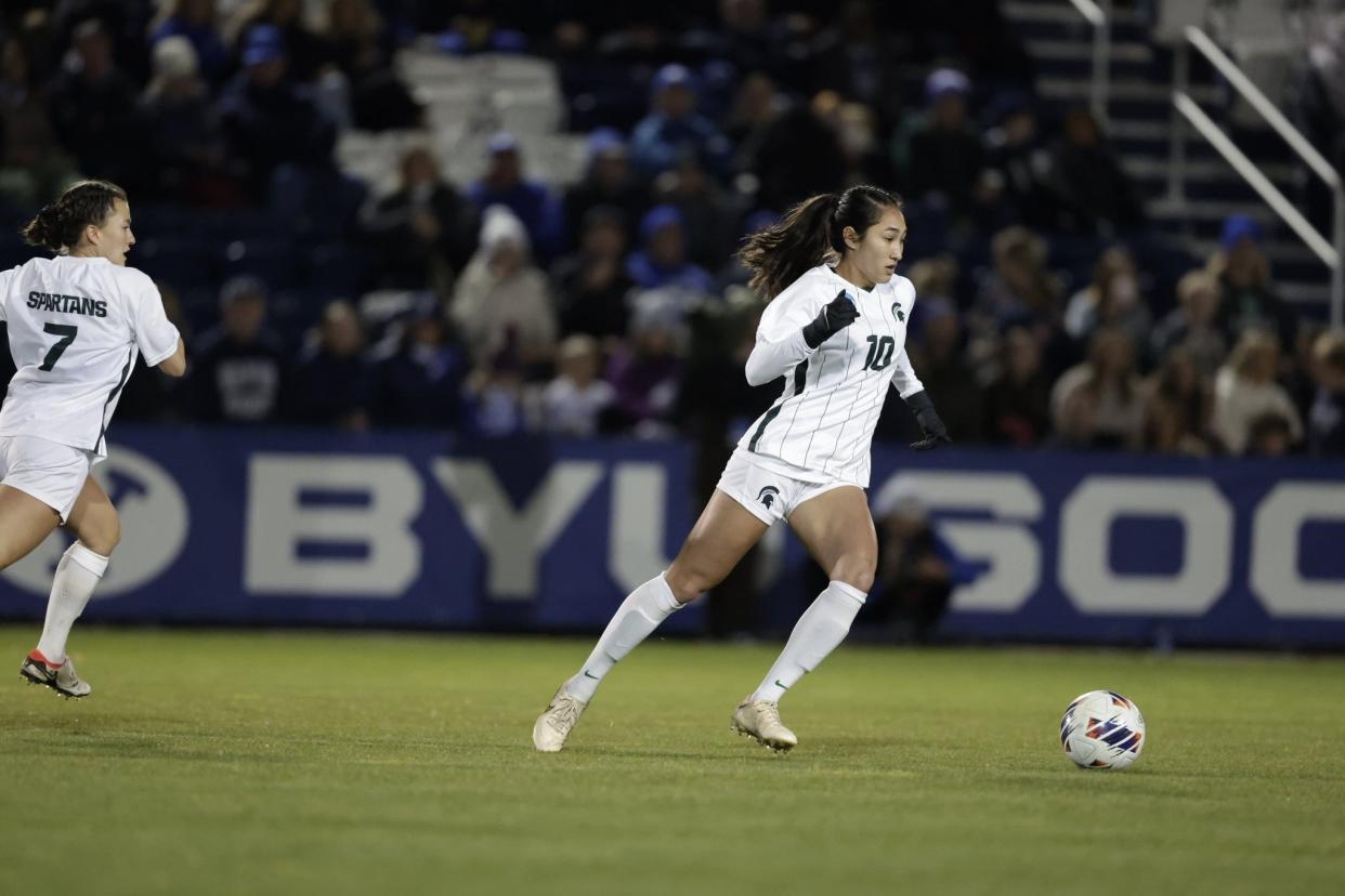 MSU senior midfielder Alex Hargrave pushes the ball forward during the Spartans' game at BYU on Saturday night in the NCAA tournament.