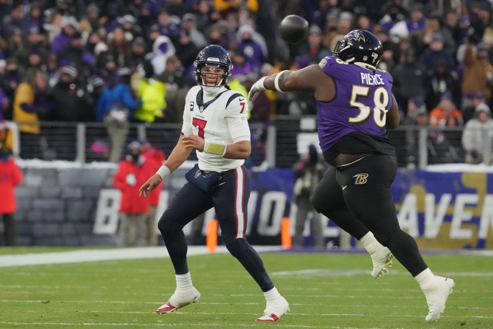 Jan 20, 2024; Baltimore, MD, USA; Houston Texans quarterback C.J. Stroud (7) throws a pass against Baltimore Ravens defensive tackle Michael Pierce (58) during the first quarter of a 2024 AFC divisional round game at M&T Bank Stadium. Mandatory Credit: Mitch Stringer-USA TODAY Sports