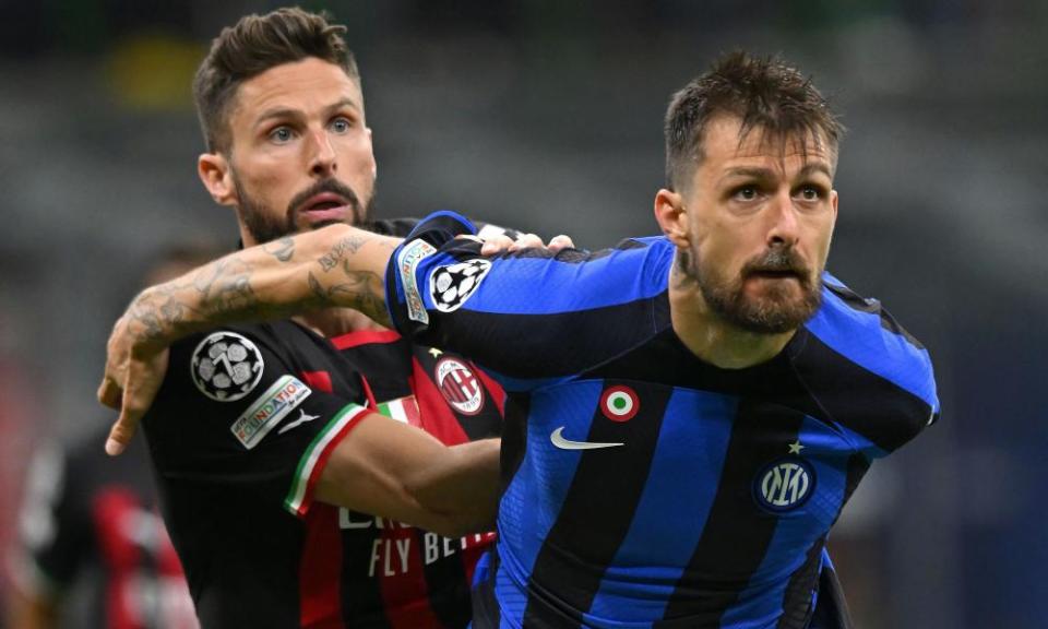 Francesco Acerbi battles with Milan’s Olivier Giroud during the Champions League semi-final.