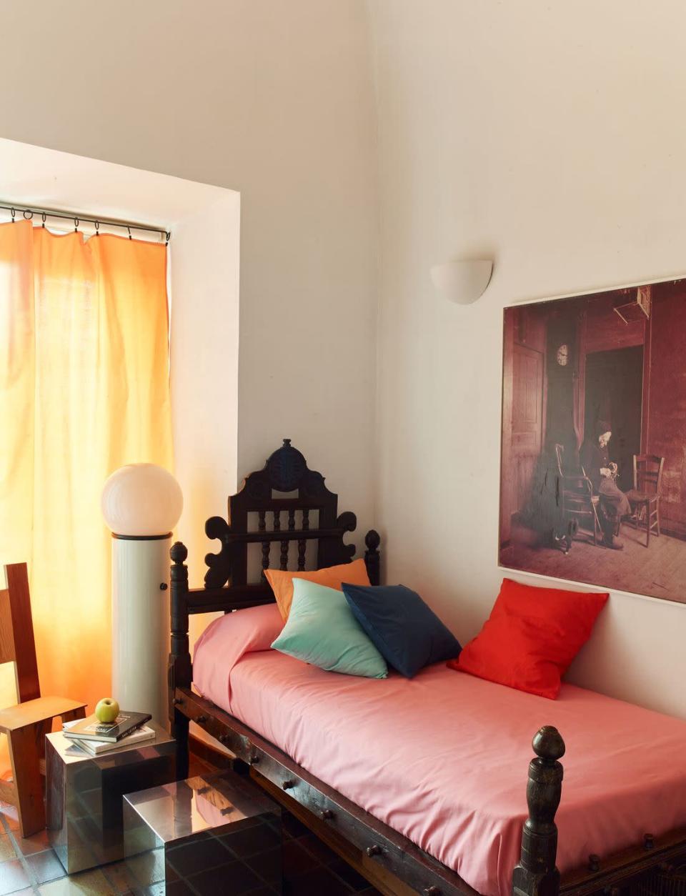 <p>Use your guest room to experiment. In this Madrid home, design studio <a href="https://www.elledecor.com/design-decorate/house-interiors/a39281225/casa-josephine-madrid-apartment/" rel="nofollow noopener" target="_blank" data-ylk="slk:Casa Josephine" class="link ">Casa Josephine</a> juxtaposed a Castillian 18th-century bed with a 1970s globe lamp and mirrored cubes as bedside tables.</p>