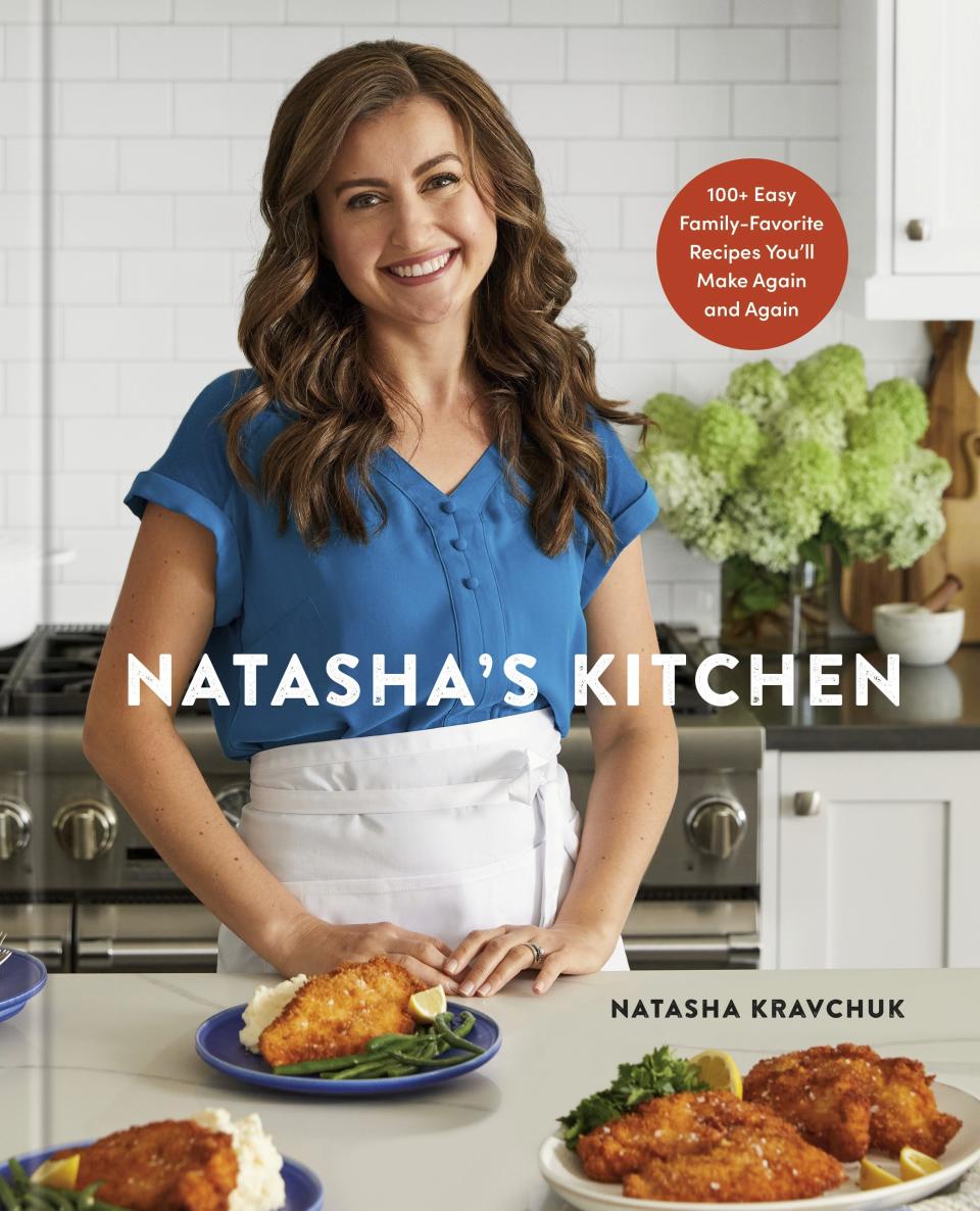 This cover image released by Clarkson Potter shows "Natasha's Kitchen: 100+ Easy Family-Favorite Recipes You'll Make Again and Again: A Cookbook" by Natasha Kravchuk. (Clarkson Potter via AP)