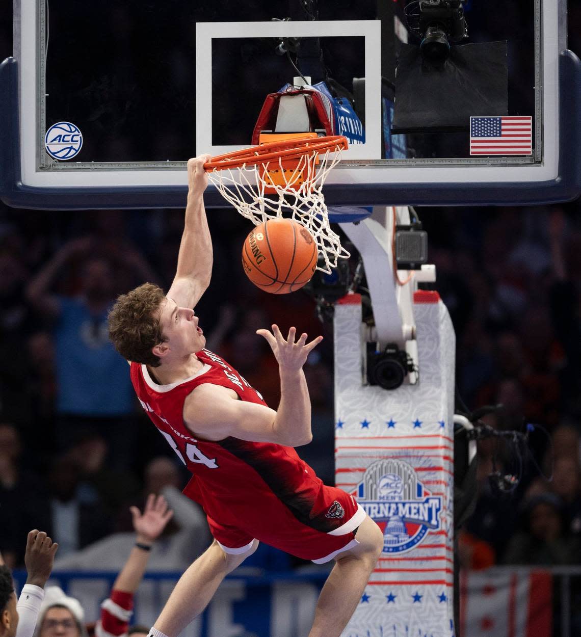 N.C. State’s Ben Middlebrooks (34) hangs on the rim after missing a dunk in the second half against Duke in the quarterfinals of the ACC Men’s Basketball Tournament at Capitol One Arena on Wednesday, March 13, 2024 in Washington, D.C. Middlebrooks was called for a technical foul on the play.