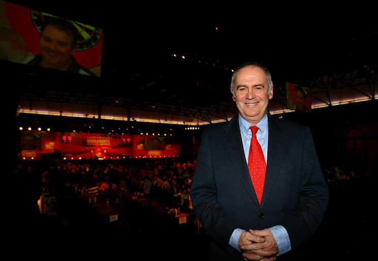 LONDON - DECEMBER 18: Commentator Sid Waddell poses following the the first round match between Phil Taylor of England and Michael van Gerwen of Netherlands during the 2008 Ladbrokes.com PDC World Darts Championship at Alexandra Palace on December 18, 2007 in London, England. (Photo by Paul Gilham/Getty Images)