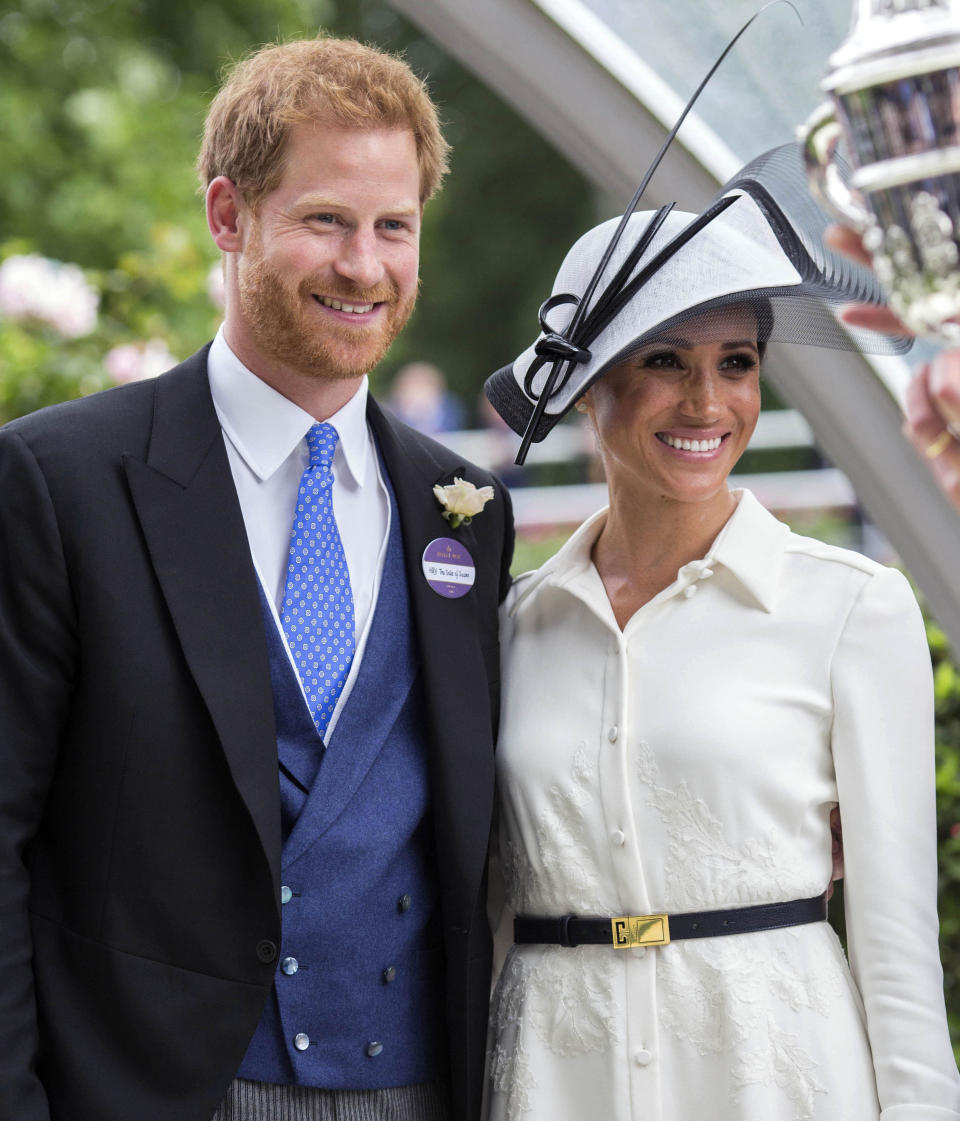 Prince Harry and Meghan Markle at the Royal Ascot Day in 2018 - Credit: zz/KGC-107/STAR MAX/IPx