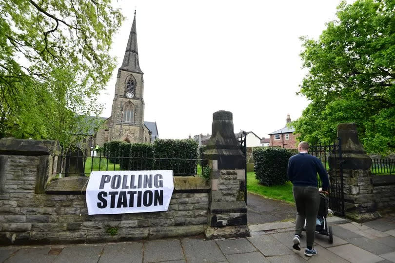Voters at St Luke's Church, Crosby. Use our interactive map to see the local elections in your area on May 2