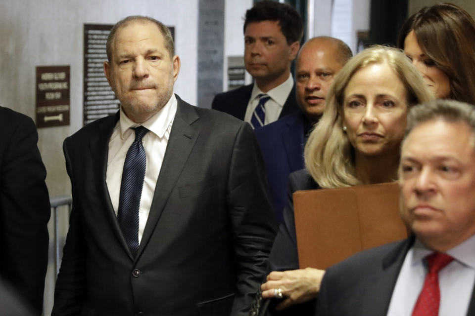 Harvey Weinstein, left, arrives at court for a hearing related to his sexual assault case, Thursday, July 11, 2019, in New York. Weinstein's lawyer Jose Baez is going to court Thursday to get a judge's permission to leave the case, the latest defection from what was once seen as a modern version of O.J. Simpson's "dream team" of attorneys. (AP Photo/Richard Drew)